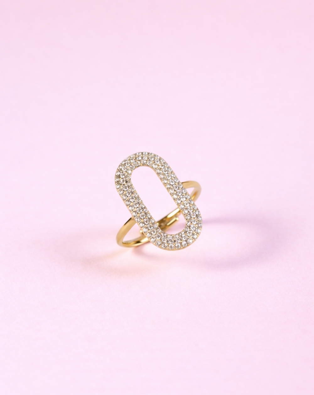 Stainless steel PAVÉ LINK Ring with elongated pavé link design on pink background - Trgovina Patrizia Ljubljana.