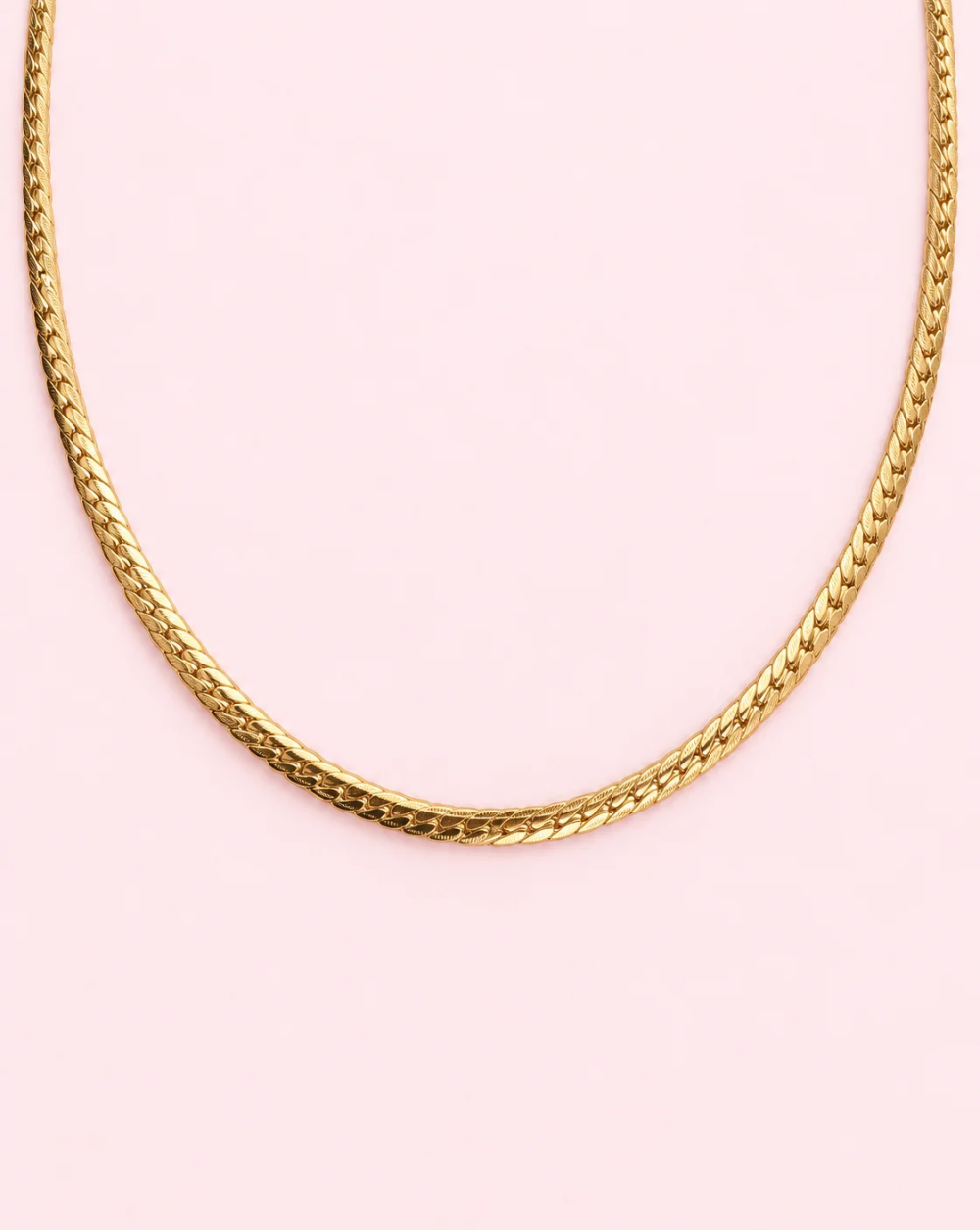 " necklace " KNIT, a stainless steel chain with densely interwoven flat links, a textured pattern, and a smooth, shiny finish – Trgovina Patrizia Ljubljana.