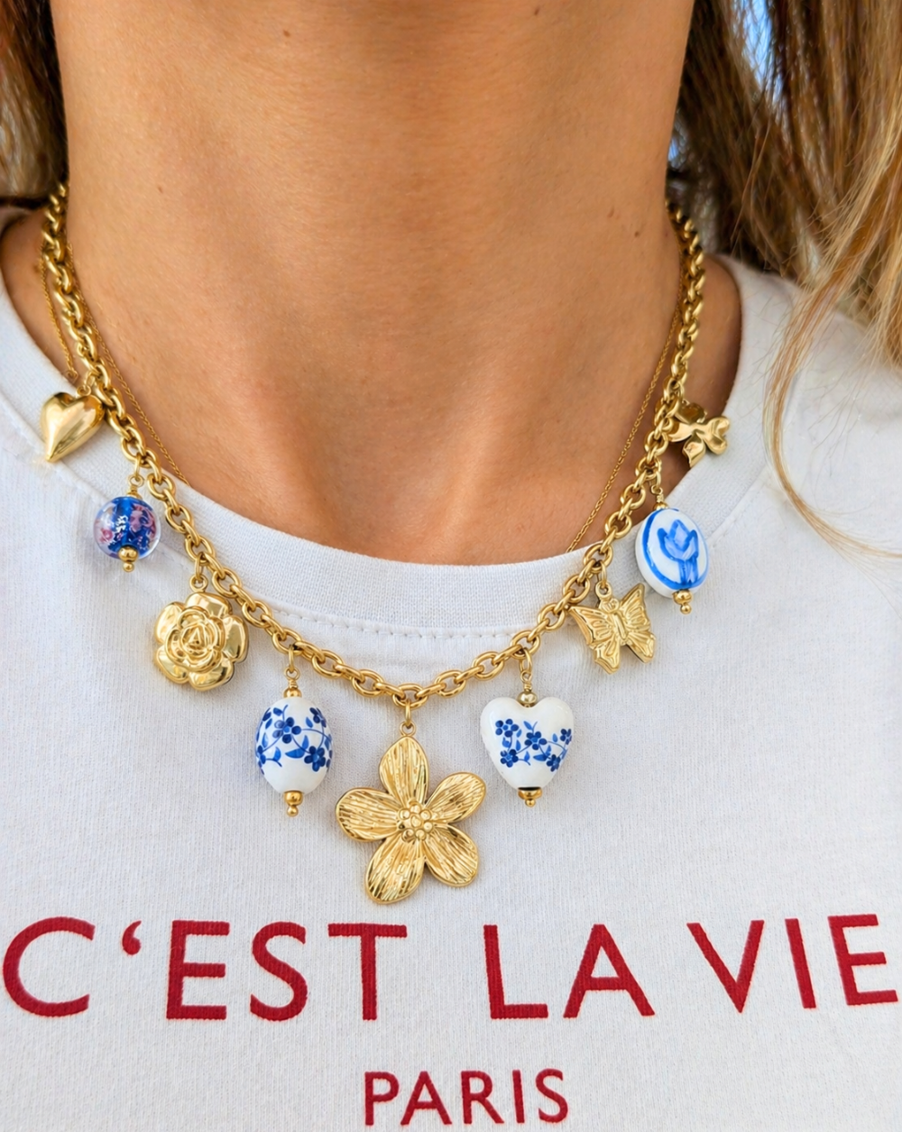 Fashion necklace pendants, floral motifs, and porcelain details made of stainless or surgical steel – trgovina Patrizia , statement summer jewelry