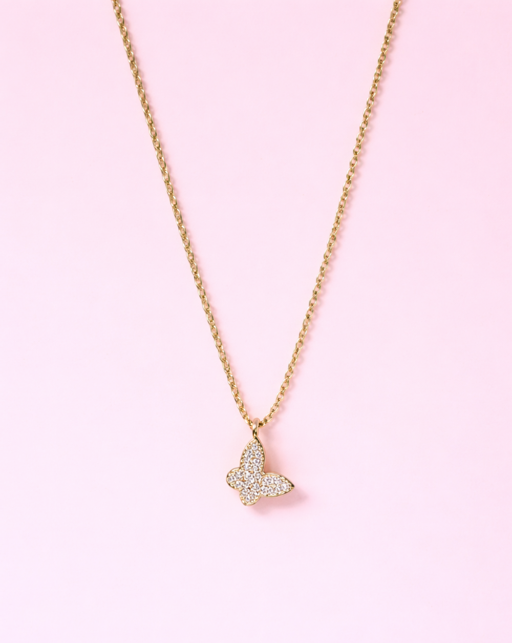 Verižica z motivom metulja in kristalčki iz nerjavečega oz. kirurškega jekla – trgovina Patrizia Ljubljana, eleganten ženstven nakit.