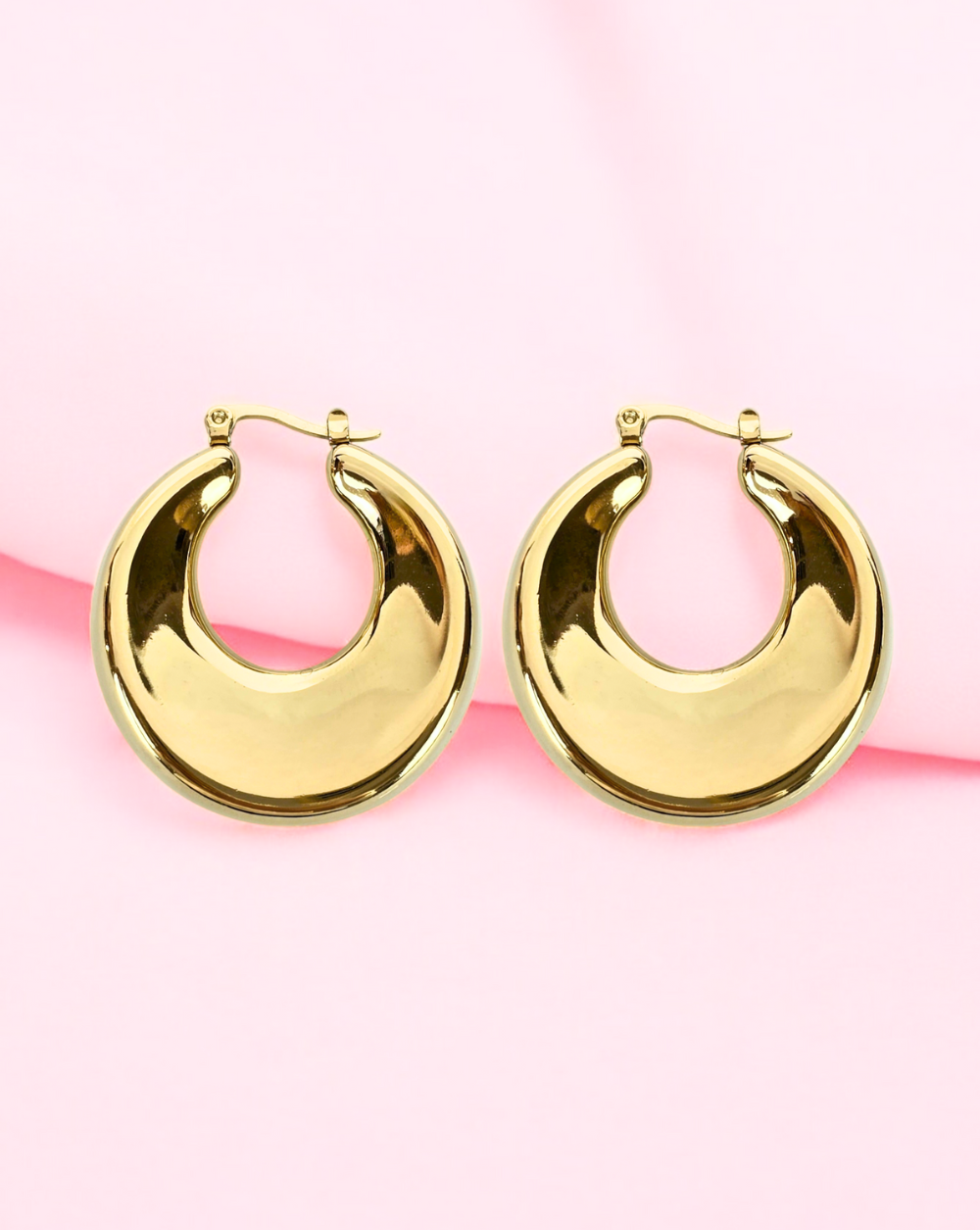 ROUNDED OVAL round earrings