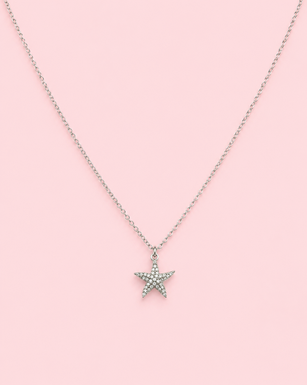 Verižica SEASTAR GLOW iz nerjavečega jekla z obeskom morske zvezde in kristalčki – Trgovina Patrizia Ljubljana.