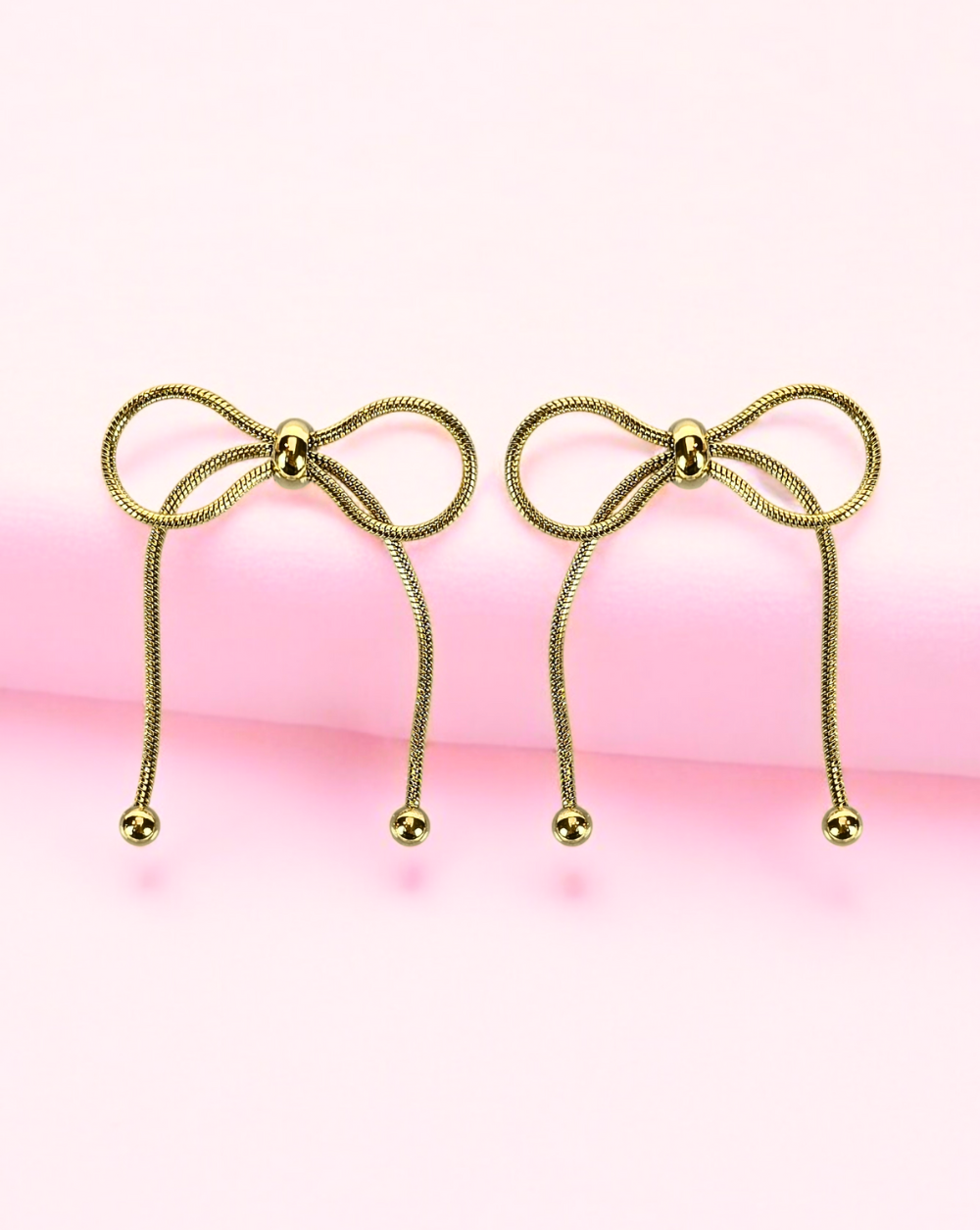 ROPE dangling earrings BOW