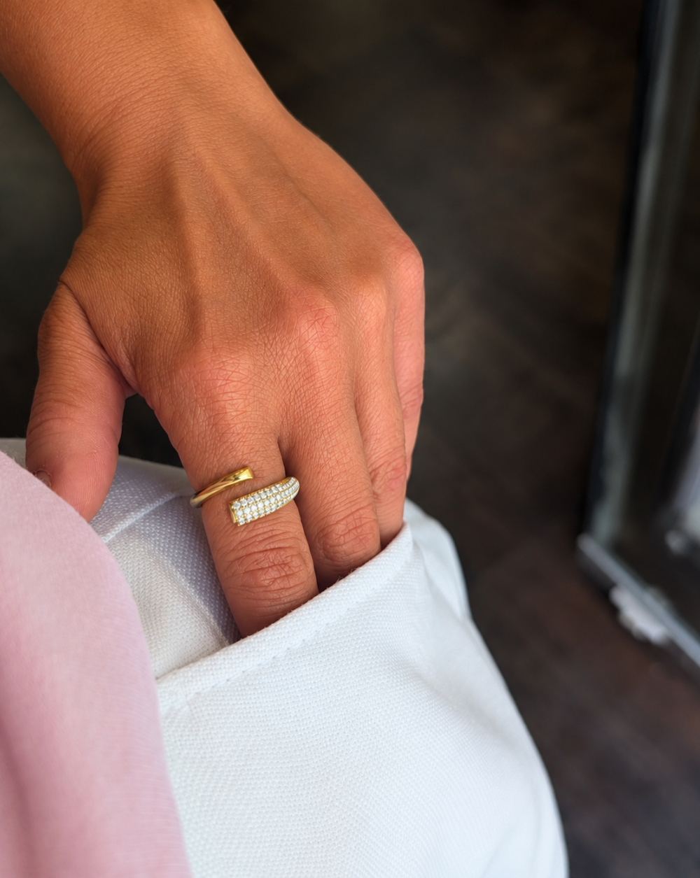 Ring 's PAVÉ WRAP in stainless steel with an open design and transparent pavé crystals – Trgovina Patrizia Ljubljana.