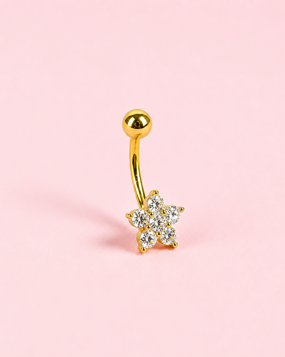 BLOOM Bauchnabelpiercing – ein Bauchnabelpiercing mit Blumenmotiv und funkelnden Steinchen für einen raffinierten und auffälligen Look. Trgovina Patrizia 