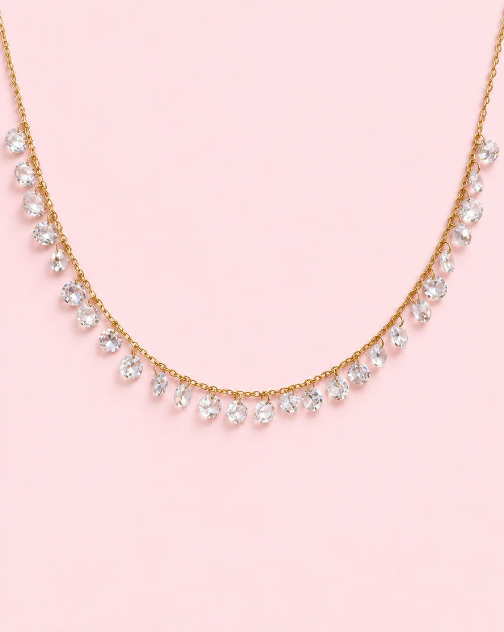 Necklace GEM DROPS, made of stainless steel, featuring numerous dangling crystal pendants of various shapes and sizes arranged along the chain – Trgovina Patrizia Ljubljana.
