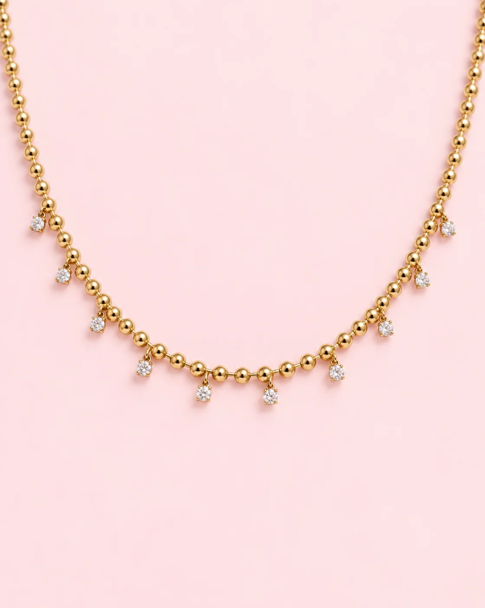 Necklace SPARKLE BEADS made of stainless steel, featuring a string of smooth round beads and tiny dangling crystals evenly spaced along the chain – Trgovina Patrizia Ljubljana.